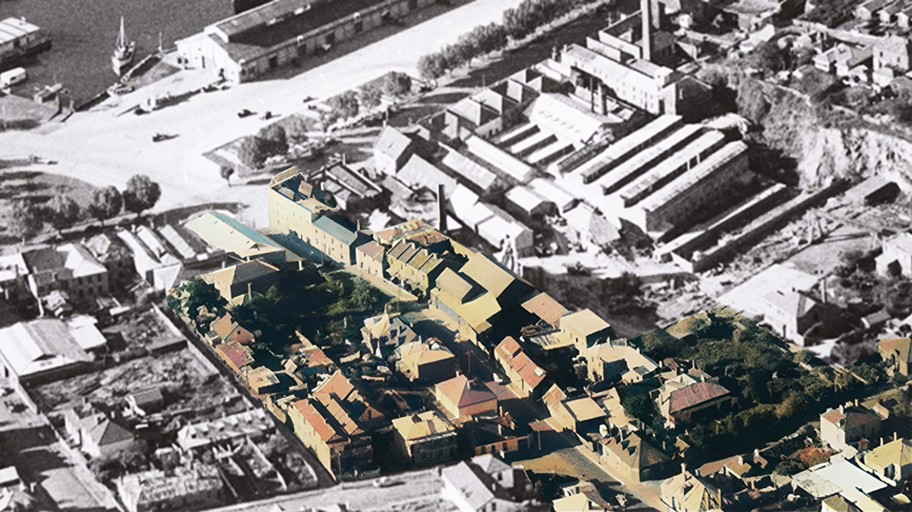 A vintage aerial image of Montpelier Retreat, looking down at workers cottages, factoires, and beautiful gardens. A vision of what the street once was. 