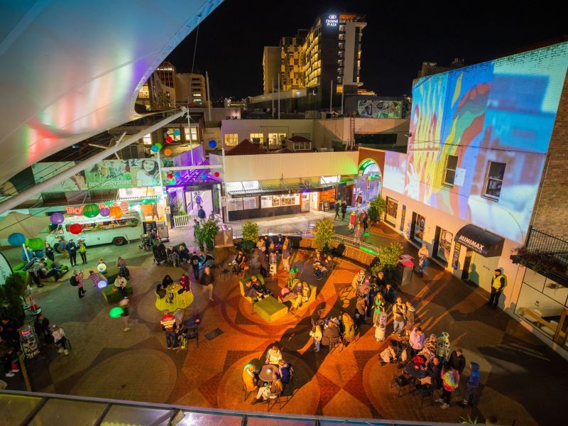 Projections and people in public area