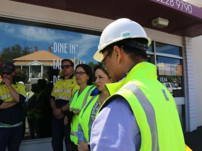 Lord Mayor, Alderman Burnet and Cheng with the works crew